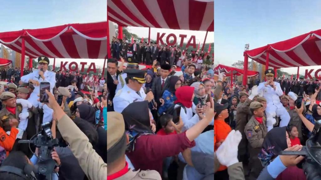 Asyiknya Diky Chandra Bernyanyi “Iwan Fals” Bersama Warga Usai Penurunan Bendera HUT ke-80 RI di Tasikmalaya