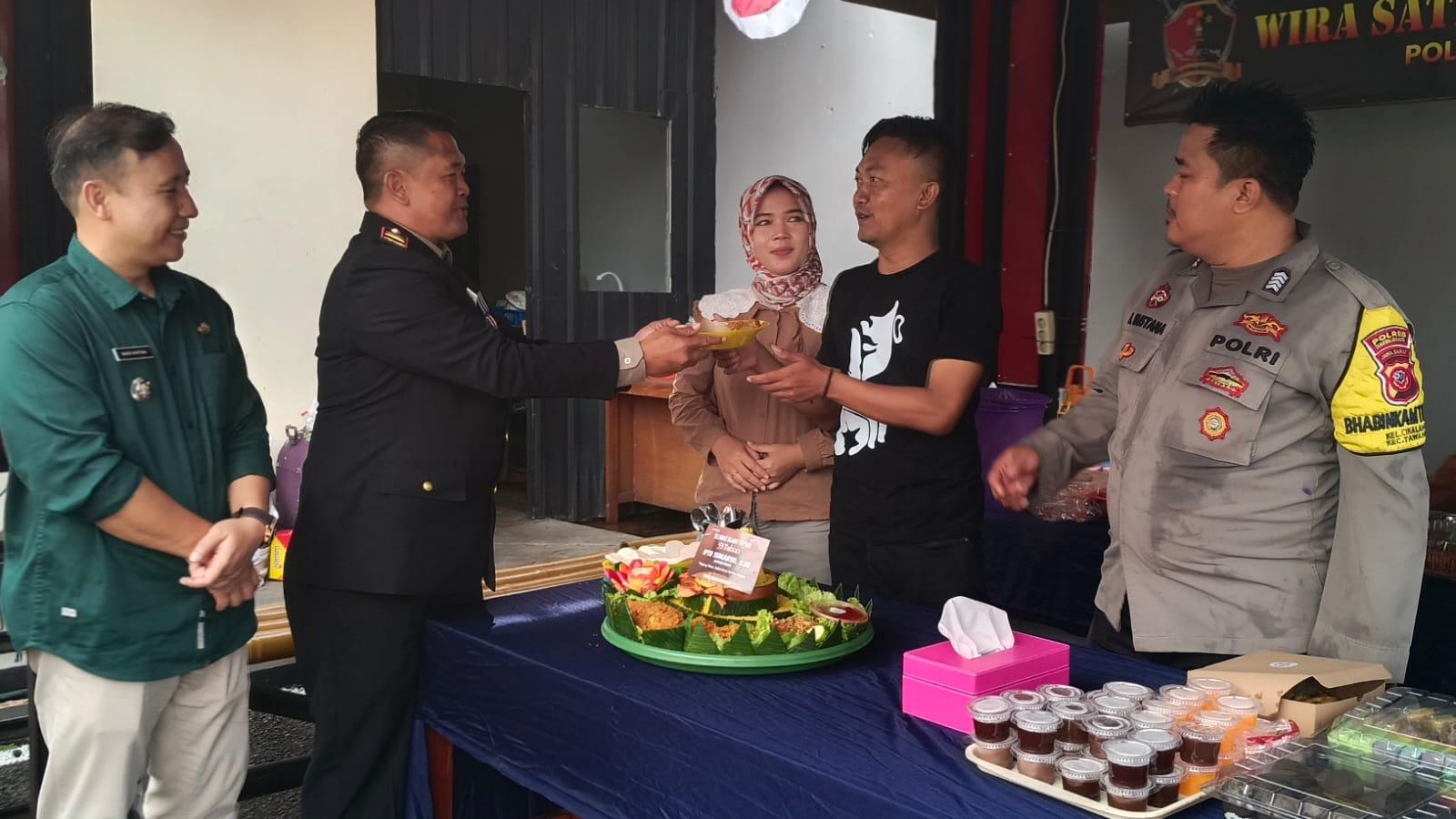 Dua Anggota Polsek Tawang Naik Pangkat Jadi Aipda, Kapolsek Berikan Kejutan di Momen HUT ke-79 Bhayangkara