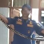 Bikin Panik Penghuni, Ular Cincin Emas 1,2 Meter Masuk Rumah Warga di Ciamis